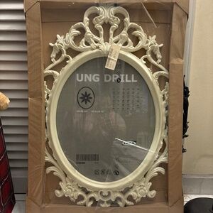 White IKEA Ung Gothic scroll frame no mirror